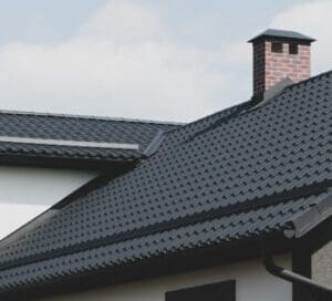 An image showing a brand new roof with a unique style of shingles