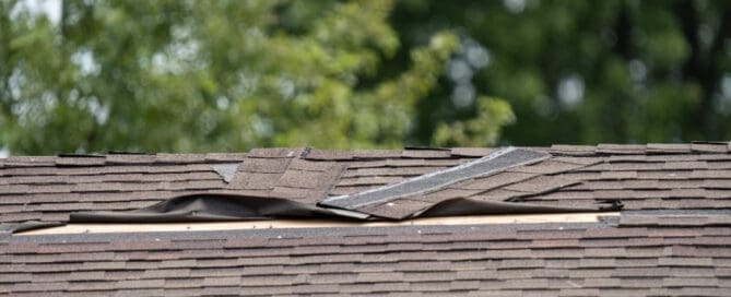 Close up image of broken roof shingles