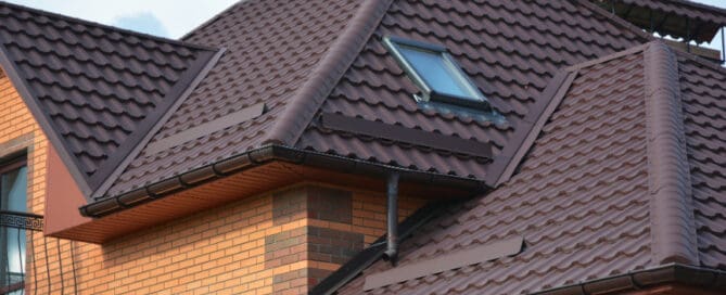 Brown roof on brick house