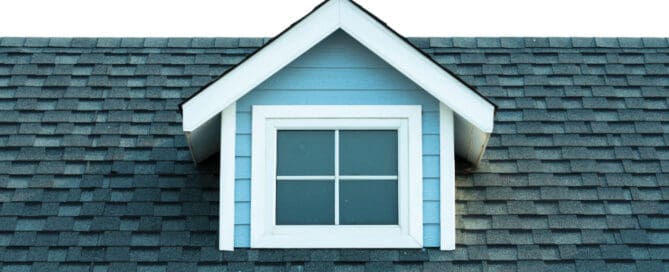 Close up of grey roof with small window