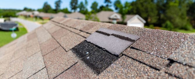 Close up of roof loose shingles-