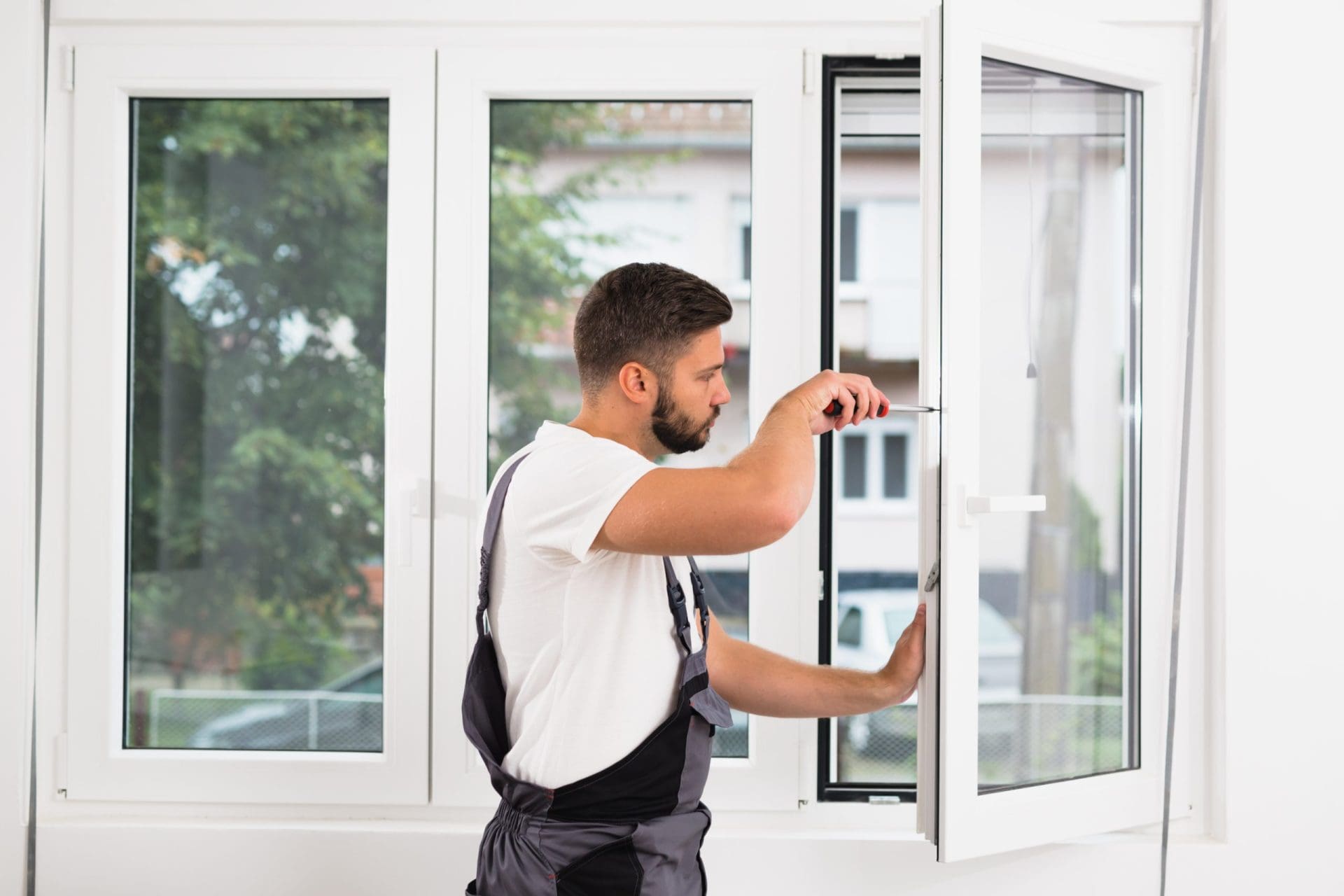 Man fixing window.