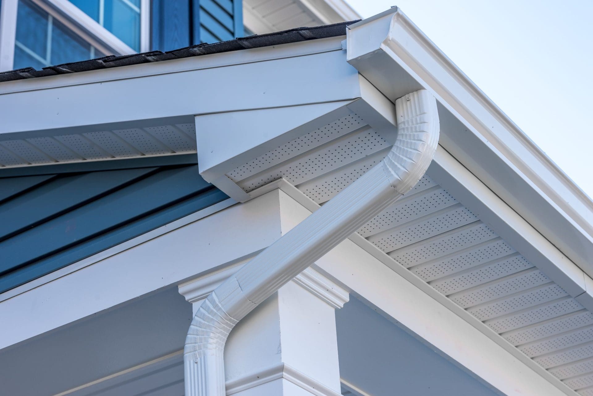 Colonial white gutter guard system.