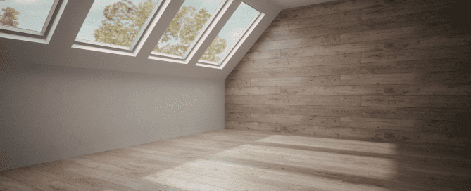 Empty room with three skylights.